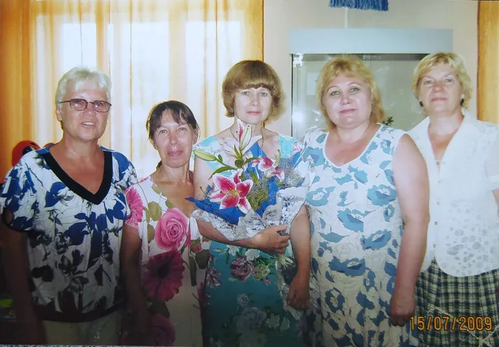 Вторая слева